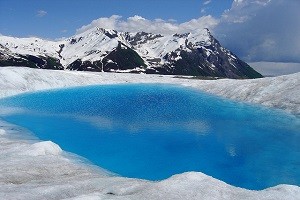 blue glacial pool in wrangell san elias